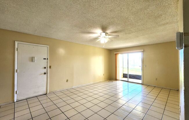 Ground Floor Unit; Lake Front View; All-Tile Flooring; Pool/Tennis/Laundry