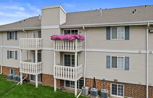 an apartment building with Bavarian inspired balconies outside sun valley apartments