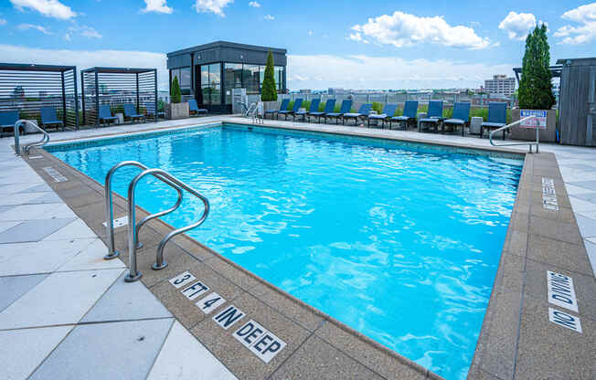 Heated rooftop pool with skytop cabanas