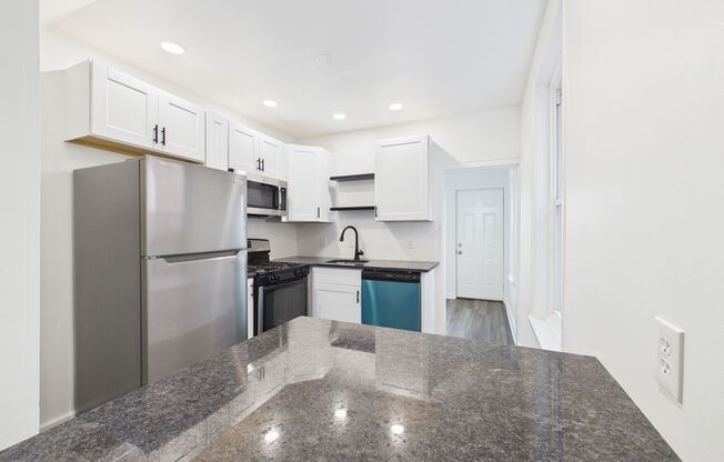 NEWLY REMODELED 2BED 1 BATH BI LEVEL WITH PATIO