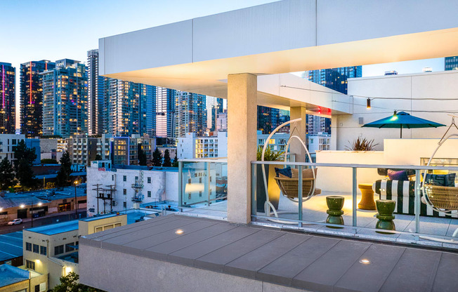a view of the city from an apartment balcony