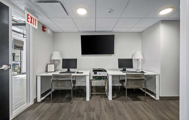 a room filled with furniture and a flat screen tv at Lakeview 3200 Apartments, Chicago, IL