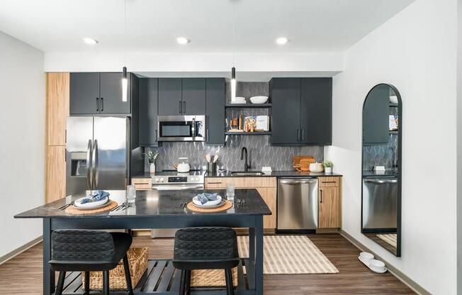 Multiple finish options - this two-tone kitchen features sleek matte black finishes, natural wood accents, and modern open shelving.