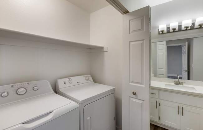 Enjoy the convenience of having a washer and dryer at your disposal at Boulders at Lookout Mountain Apartment Homes, Phoenix