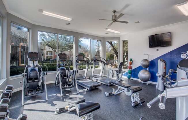 Plano, TX Apartments for Rent - Carrington Park Fitness Center with Treadmills, Free Weights, and Ellipticals