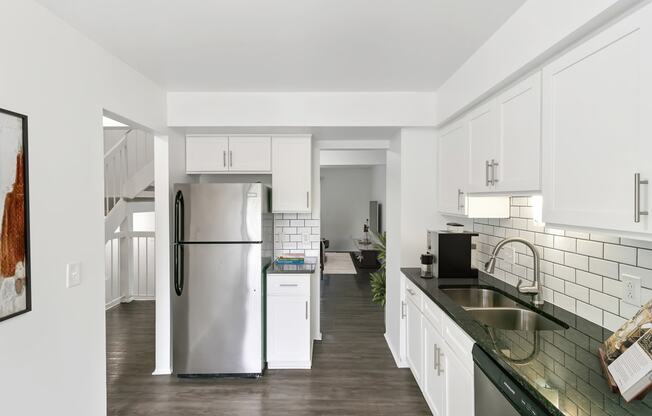 Fully Equipped Kitchen With Modern Appliances at The Village of Hyde Park, Detroit, Michigan