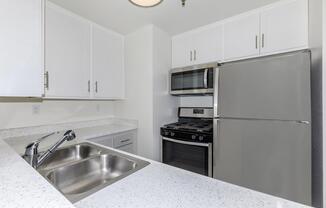 a stainless steel refrigerator in a kitchen