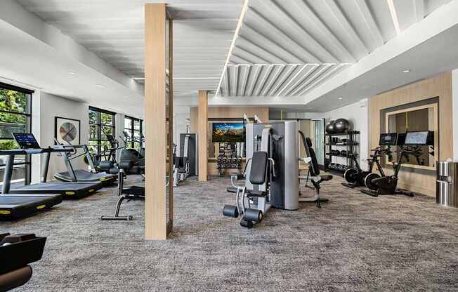 Expansive fitness center offering state-of-the-art machines, free weights, and open space to energize your routine