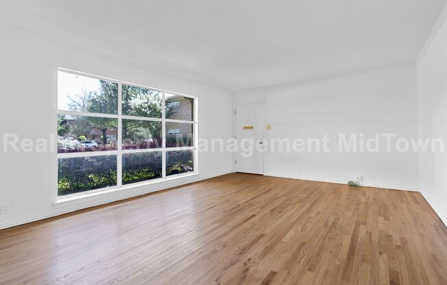 Live Elevated in the Heart of Viridian – Stunning Island Townhome!
