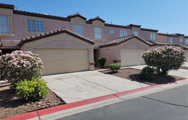 HIGHLY UPGRADED 2-STORY TOWNHOME IN GATED COMMUNITY!