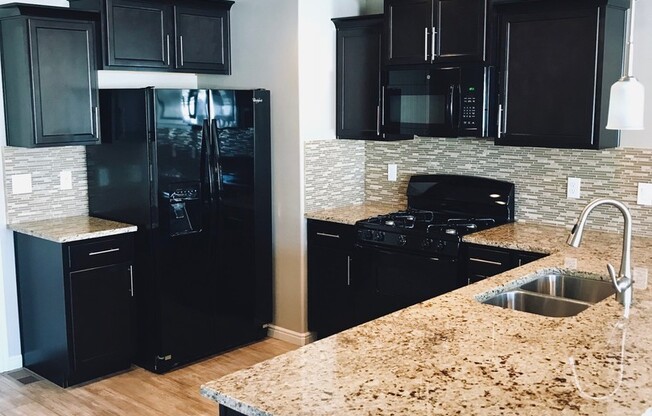 4 Bedroom/3 Bathroom Townhome in Riverton!