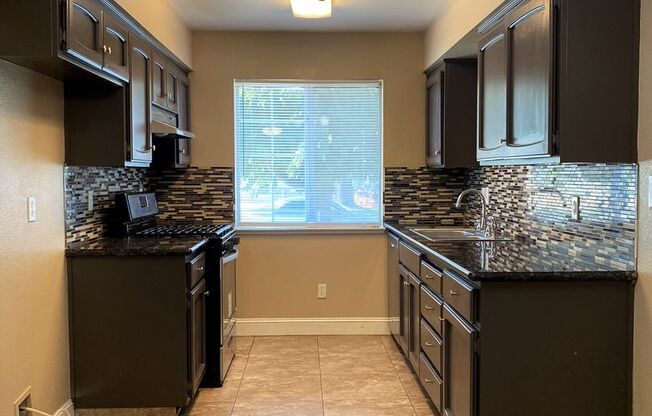 Cute home with fenced yard and driveway. Available now!!!
