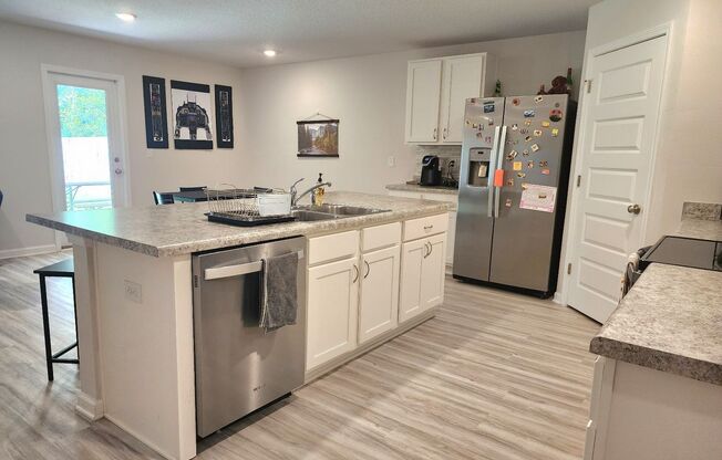 Almost Brand New 4 Bedroom, 2 Bath located in the heart of Pace!