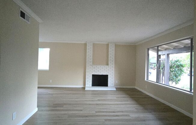 Spacious Single Family Home, Fresh Paint, New Wood Flooring, Nice Yards!