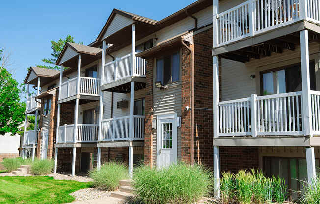 an exterior view of an apartment building with balconies