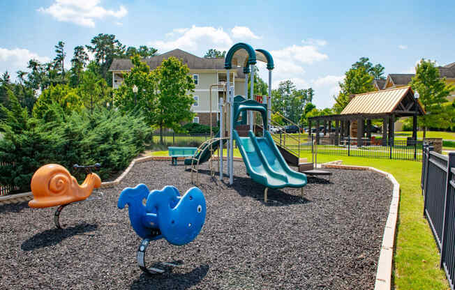 Children have a place to run and play at Alden Place too! Slides, Climbing Equipment and Bike Parking at Ashby at Ross Bridge, Hoover