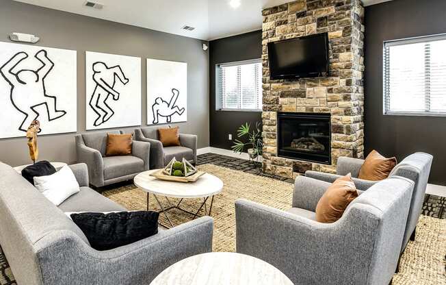 Clubhouse with TV and cozy fireplace at Tamarin Ridge in Lincoln, NE