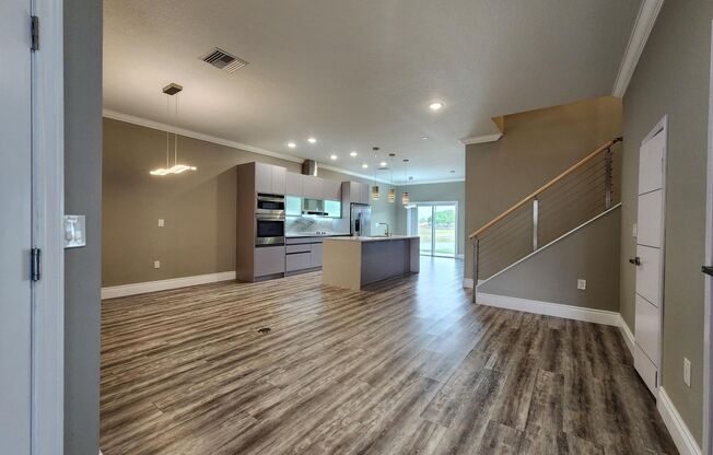 Beautifully Modern 4 Bed 3.5 Bath Townhome in the Providence Golf and Country Club!