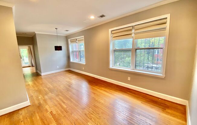 Logan/Dupont 1BR 1BA unit with hardwood floors, W/D and a balcony!