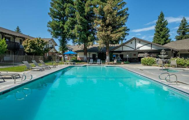 Outdoor Swimming Pool with Large Sundeck and Wi-Fi  at Scottsmen Too Apartments, Clovis, CA