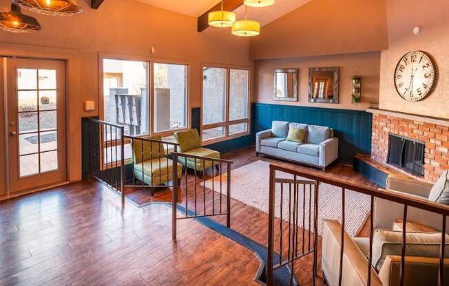 A living room with a fireplace and a couch.