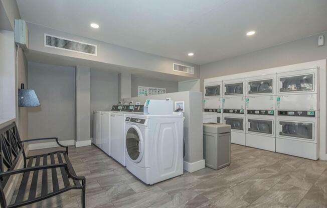 a kitchen with a refrigerator in a room