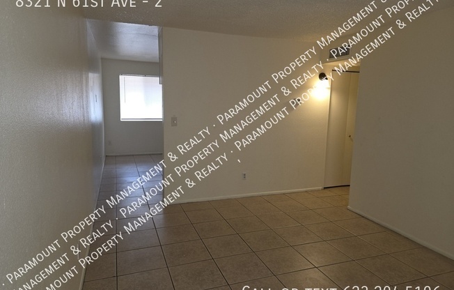 8321 N 61 AVE