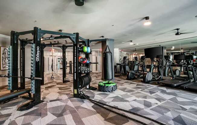 the gym at the has weights machines and other workout equipment