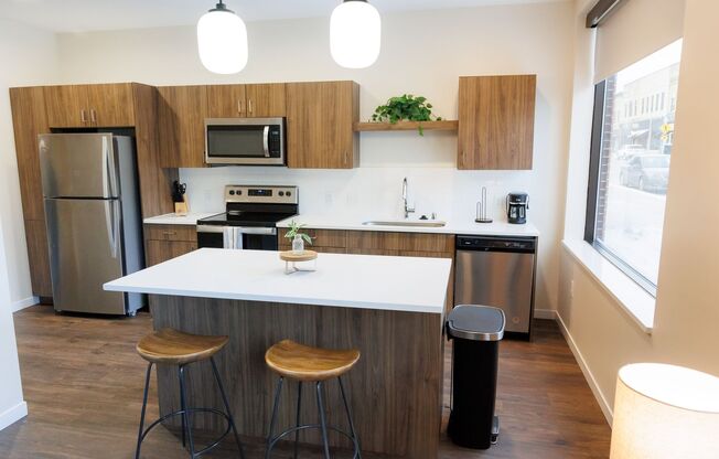 1 bed, 1 bath, 704 sqft, $1,315, Unit 104