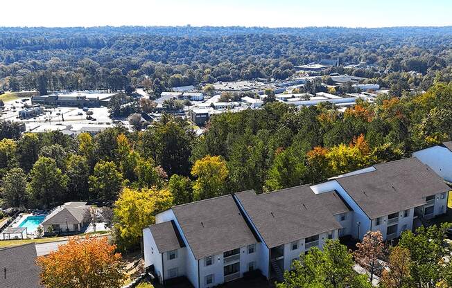 a aerial view of a neighborhood with houses and trees