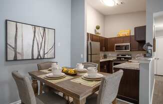 Dining Area and kitchen at Centennial Crossing Apartments in Nashville Tennessee 2024.jpg