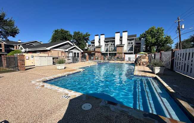 A pool with the words "NO DIVING" written on the ground.