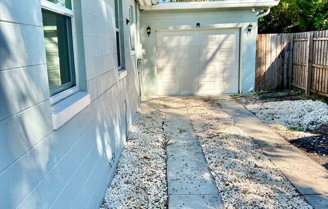 Gorgeous updated 2-bedroom 2-bath home with garage and fenced in backyard