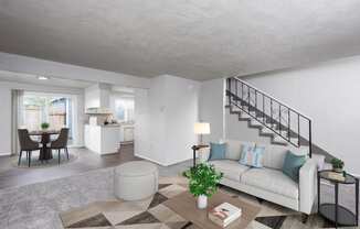 a living room with a couch and a table