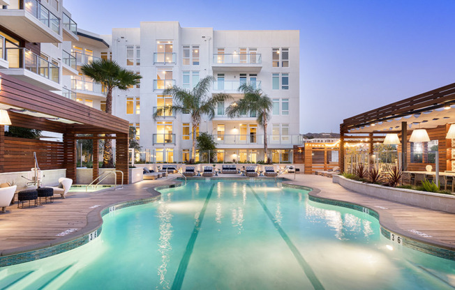 Swimming pool with lounges and cabana seating