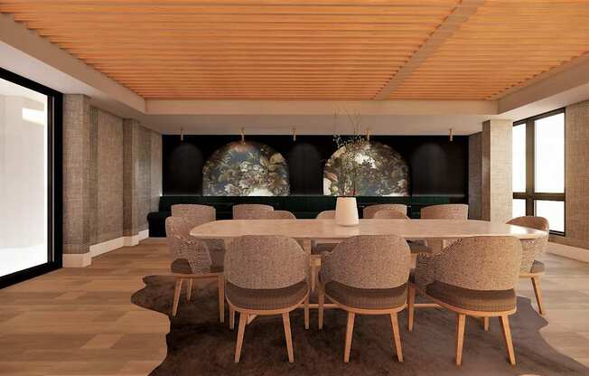 A modern dining room with a large table and chairs.