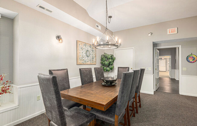 a clubhouse dining area with table and chairs at Black Sand Apartment Homes, Nebraska