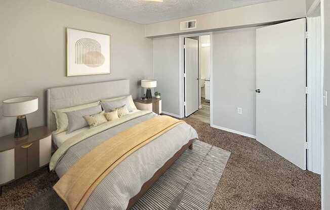 A bedroom with a large bed and a painting on the wall.