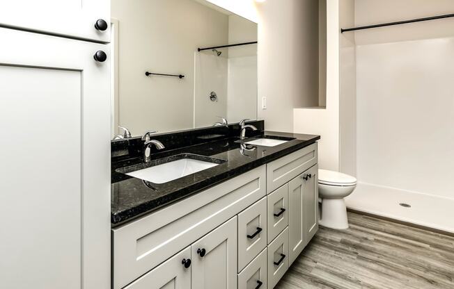 Large bathrooms with granite countertops at Edge 204 Apartments in Omaha, NE