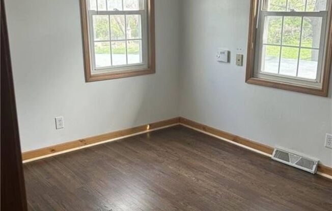 NEW Lower Rate! Beautiful 4 Bedroom Home with extension work garage/work space