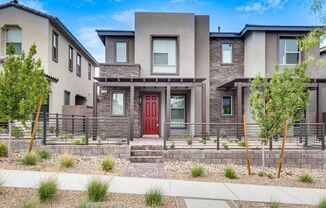 Newly built 2 story home with modern designer finishes located in the newest part of Summerlin West!