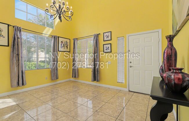 NW!! 4 Bedrooms!!! All Tile and Pergo flooring T/O!! NO Carpet!!! Low Maintenance Desert landscaping front and back!! With Patio cover in back!!!