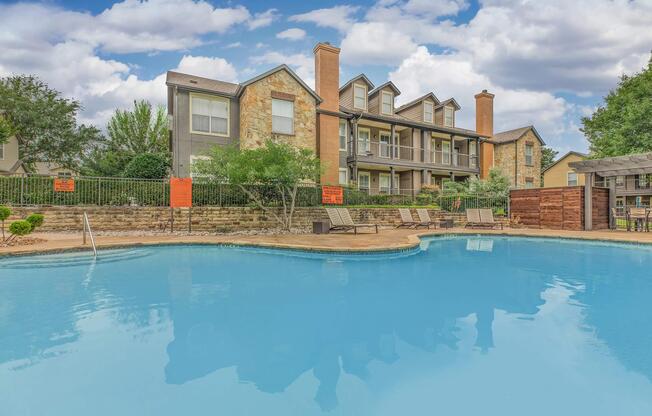 a house with a large pool of water