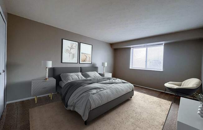 Bedroom with a bed, area rug, dresser, and chair