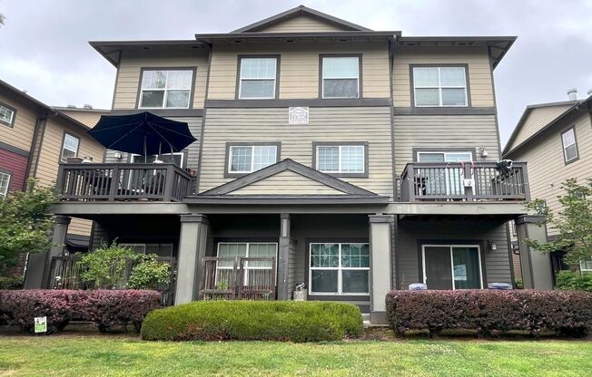 Charming 2-Bed Townhome in Sherwood with Pool Access, Garage, and Vaulted Ceilings!