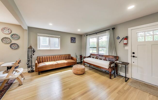 Welcome to this fully renovated, contemporary row home nestled in Michigan Park!