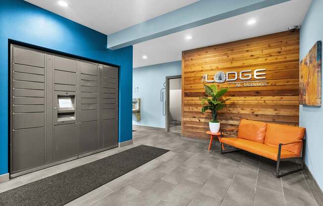 A room with a blue wall and a wooden sign that says "LODGE".