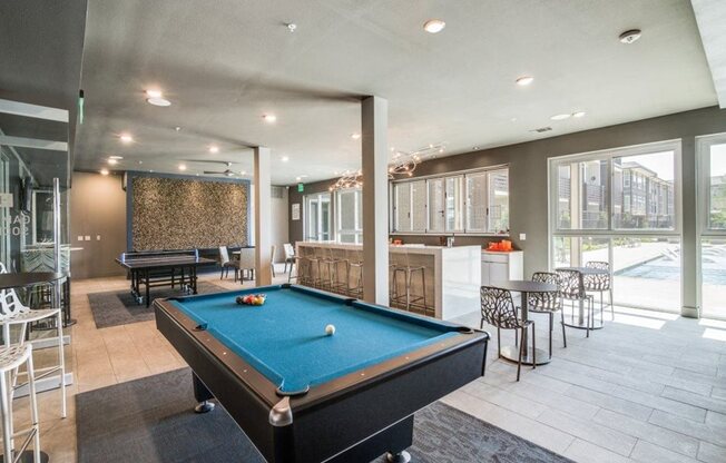 Entertainment Media and Game Room with Billiards, Ping Pong, & Foosball