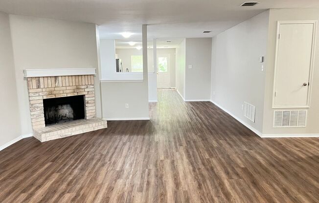 Happy home with a spacious floor plan that backs up to a greenbelt!