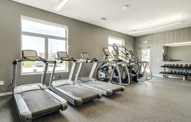 Treadmills and stair climbers in the fitness center at The Villas at Falling Waters in west Omaha